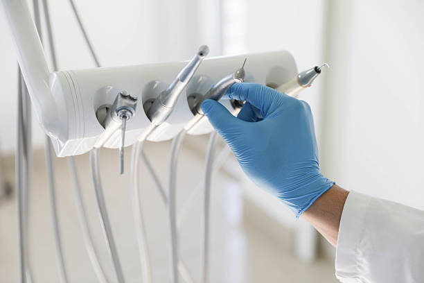 Professional Invisalign Clear Aligners technician working in Hamshire, TX
